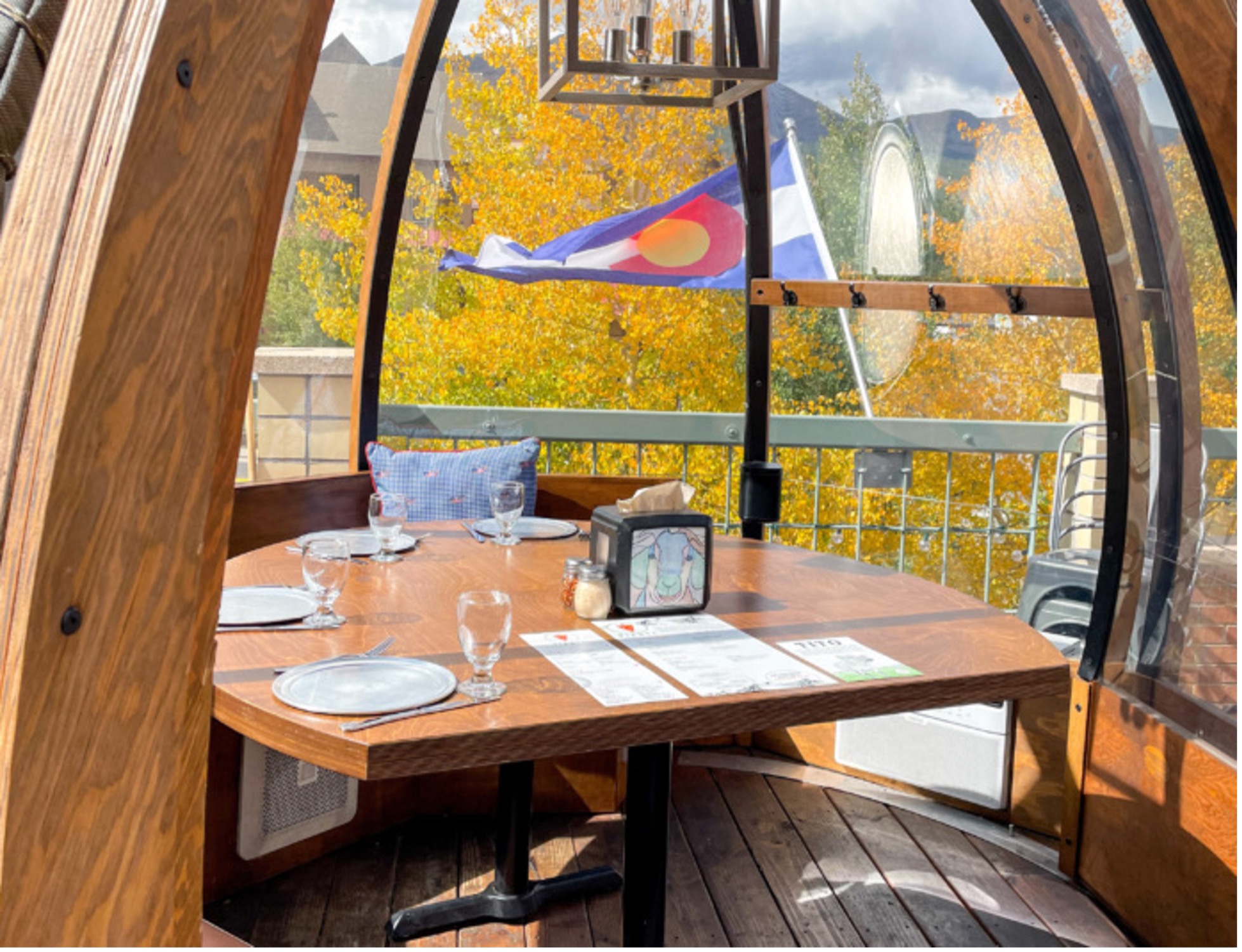 Restaurant with Colorado flag in background