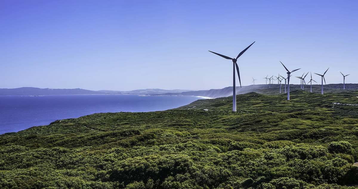 Wind Turbines on a hillside near water