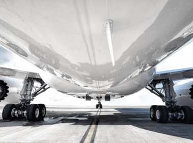 Airplane sitting on runway waiting to takeoff
