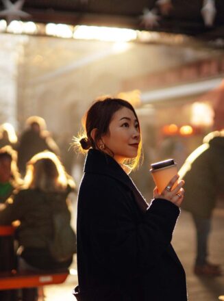 Woman with Coffee Observing