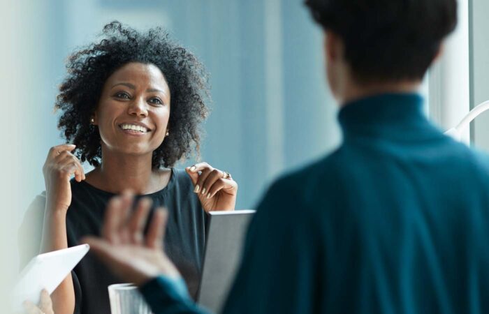 Business Professionals Discussing Travel Program Priorities